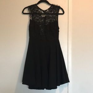 Sleeveless crocheted mini dresses in medium